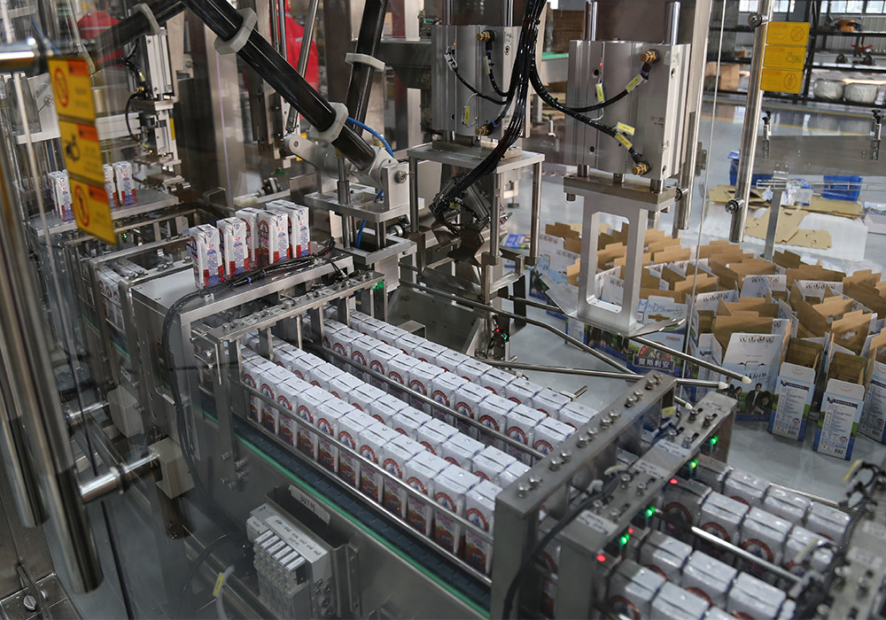 Drilling milk package gift box packaging production line