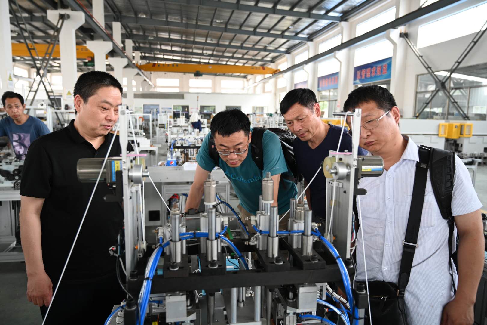 Professor Chen and Professor Shi of Jilin University help improve mask machine technology