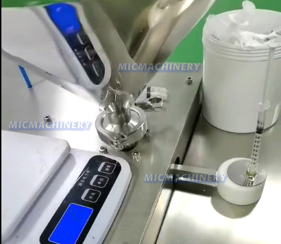 MIC Semi Automatic Syringe Filling machine ( Glass, Plastic Syringe, 10-30 syringes/min )