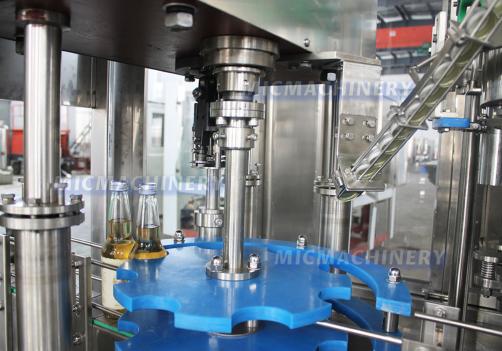 MIC-50-50-10 Glass Bottle Filling Machine Price ( 14000 BPH )
