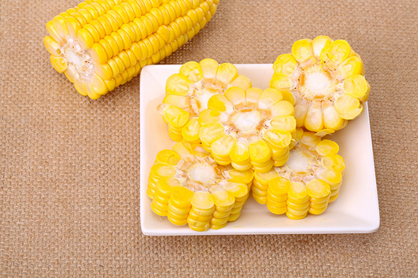 Why does the quick-frozen sweet corn kernels taste sweet? Are they genetically modified?