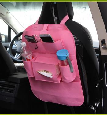 Automobile seat containing hanging bag