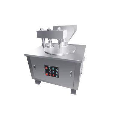 Compressed biscuit machine