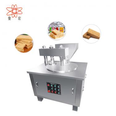 Compressed biscuit machine
