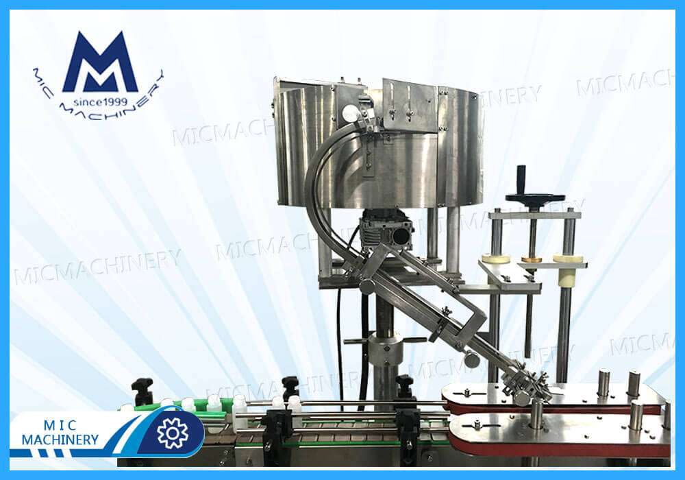 Toilet cleaner capping machine with gun cover adjustment