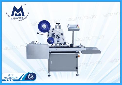 Paging adhesive labeling machines