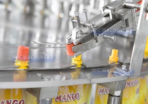 MIC Juice Spout Pouch Packing Machine ( 90-100 Pouchs/Min)