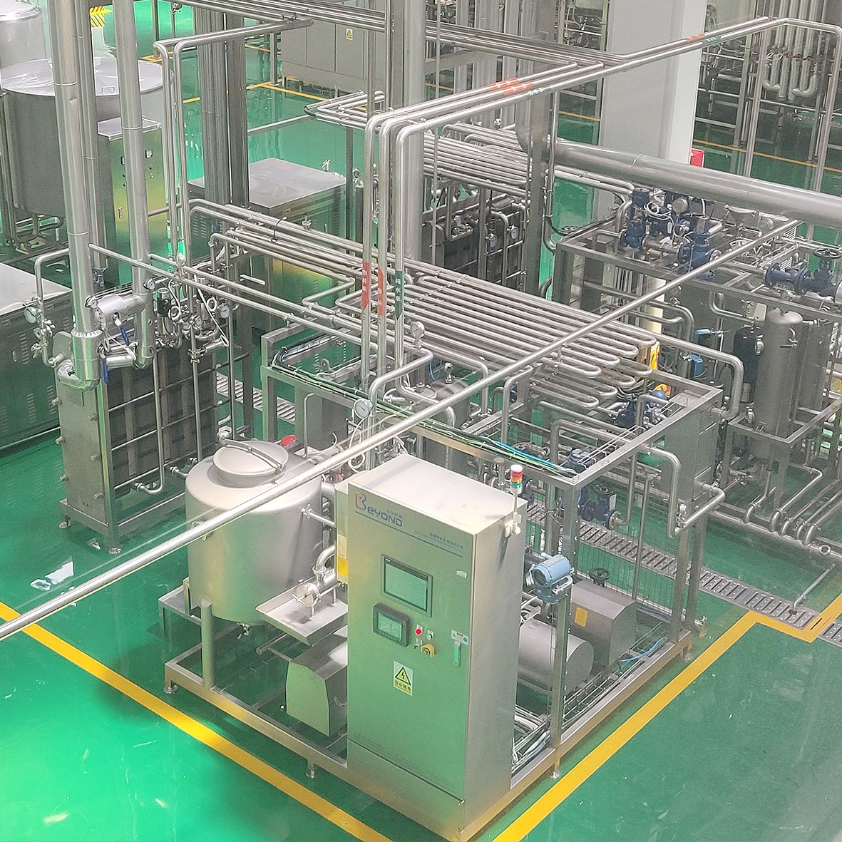 Milk production line and pasteurizer