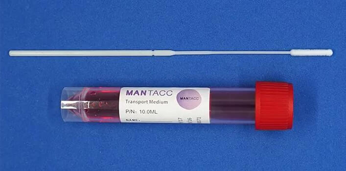A swab and a red cap tube filled with scarlet transport medium