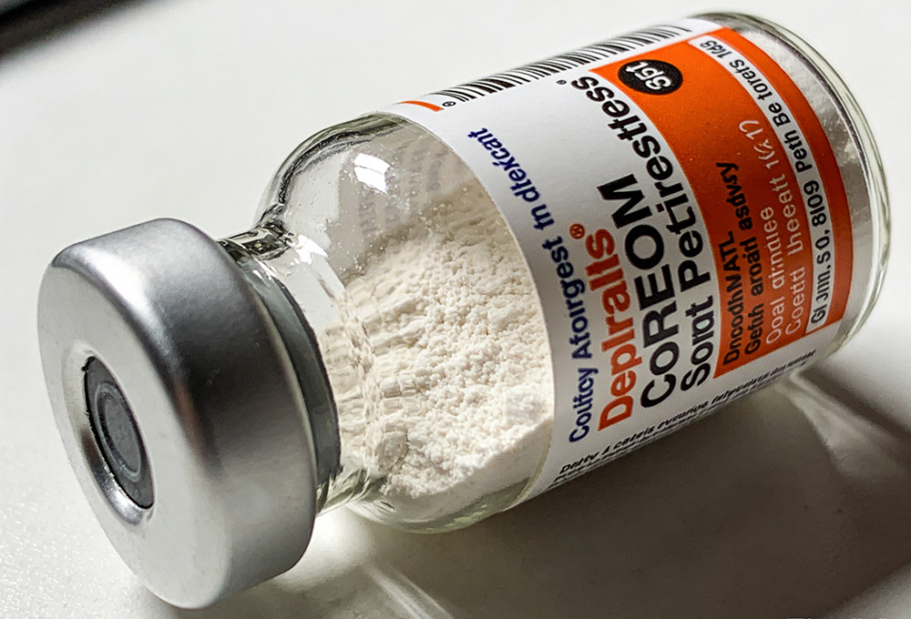 a small bottle of medicine