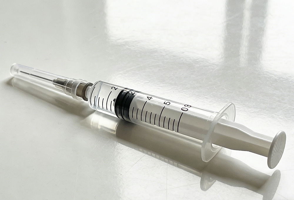 a newly opened syringe