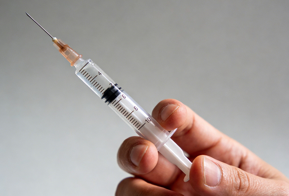 the scale line of the syringe