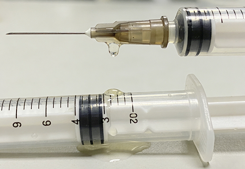 leakage at the seal of the syringe