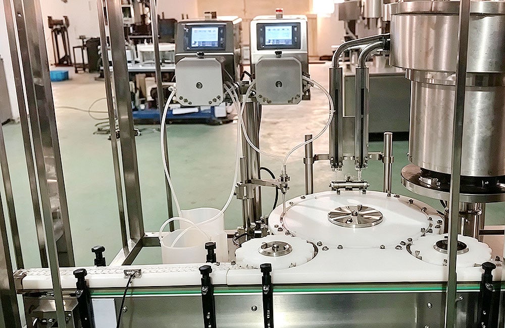 Vial liquid filler