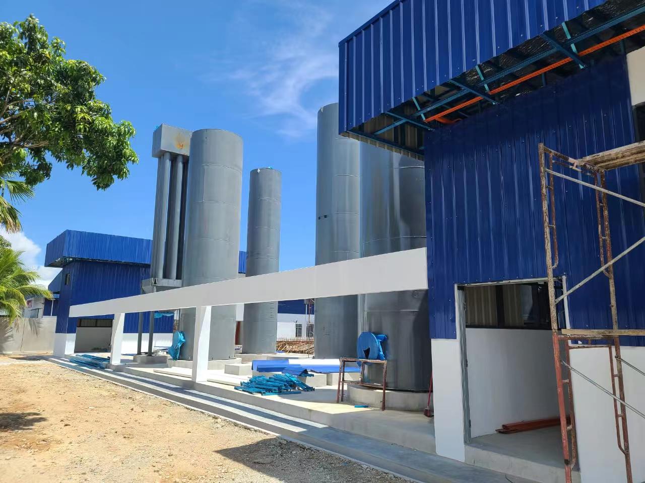 Outdoor installation of biomass gasification and syngas cooling equipment at a POWERMAX power plant