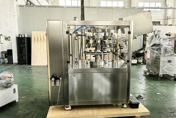 Packaging tube filling machine