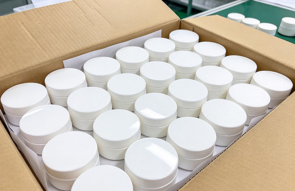 Cosmetic jars in carton box